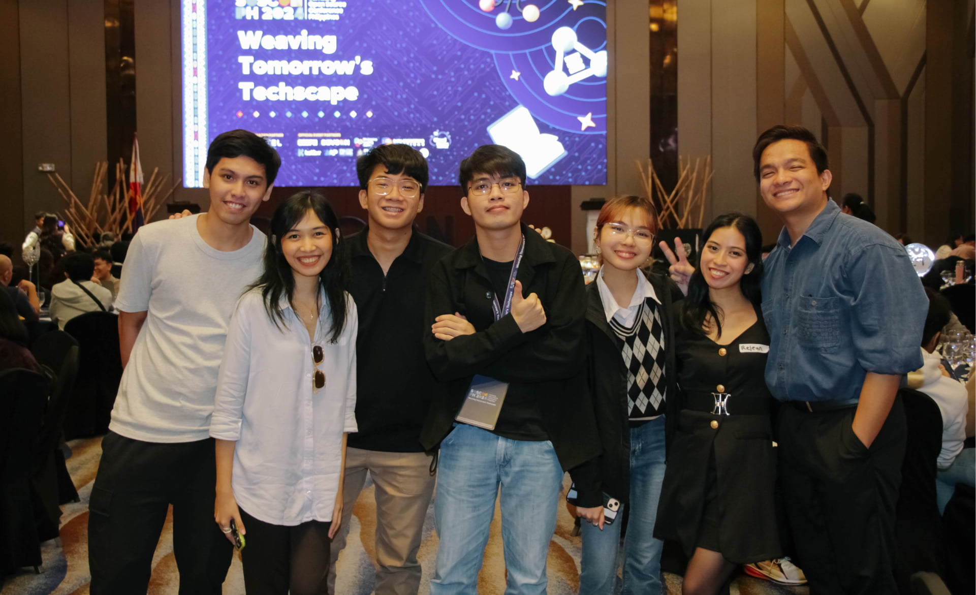 SOSCON PH 2024 attendee Karl Marquez (center) together with other conference participants